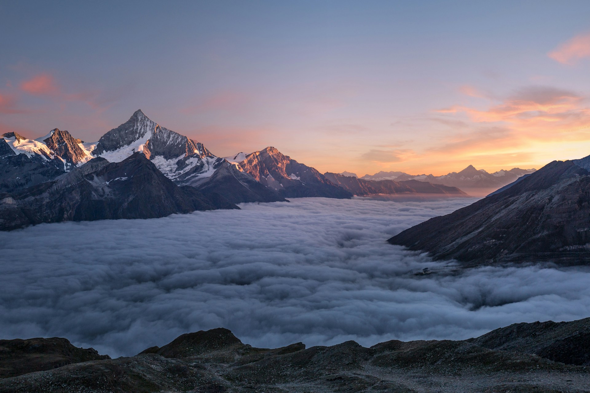 Shiv Bhoomi - Holistic Healing & Spiritual Alignment: Majestic mountain landscape with mist and golden light - representing strength, spiritual aspiration, and inner peace.
